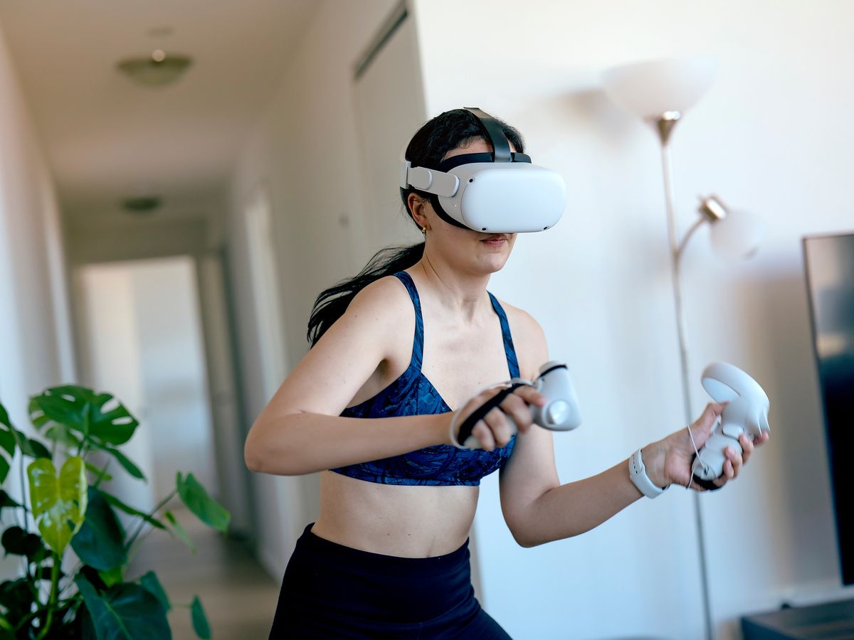 young lady wearing Virtual Reality VR Headset.